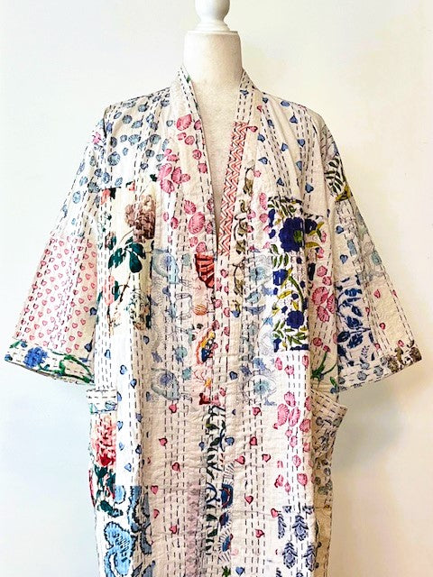 Bright Garden Quilt Robe Is Colorful Against a White Background