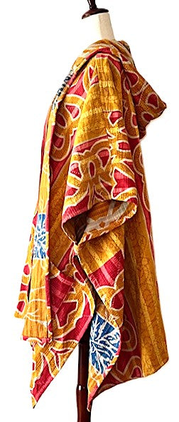 Kantha Bae Peace and Love Poncho. (Red Abstract)