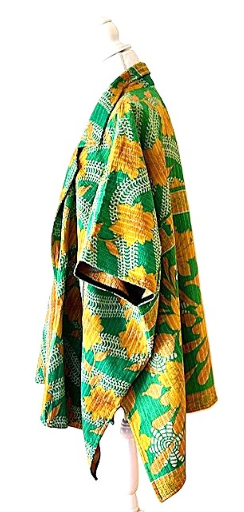 Fully Reversible Blanket Coat Is Bold In Green and Orange.