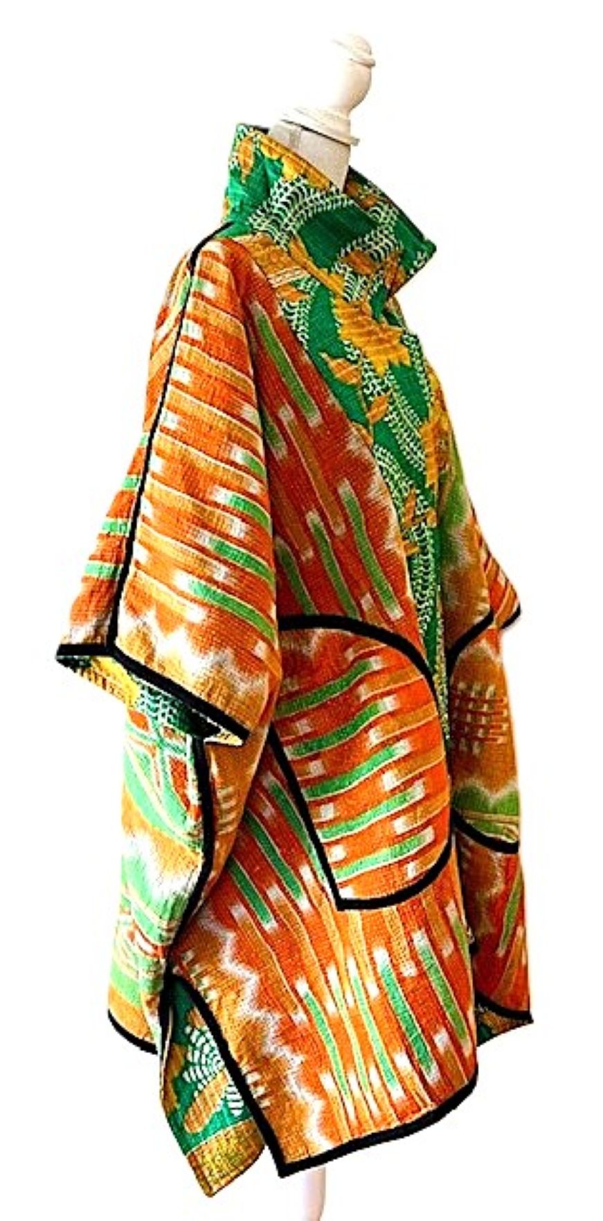 Fully Reversible Blanket Coat Is Bold In Green and Orange.