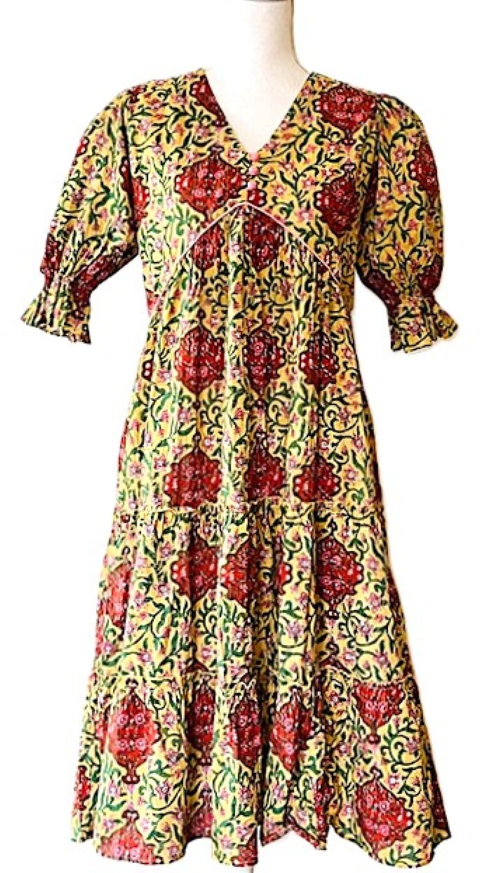 Elegant Block Print Knee Length Dress In A Complex Print.