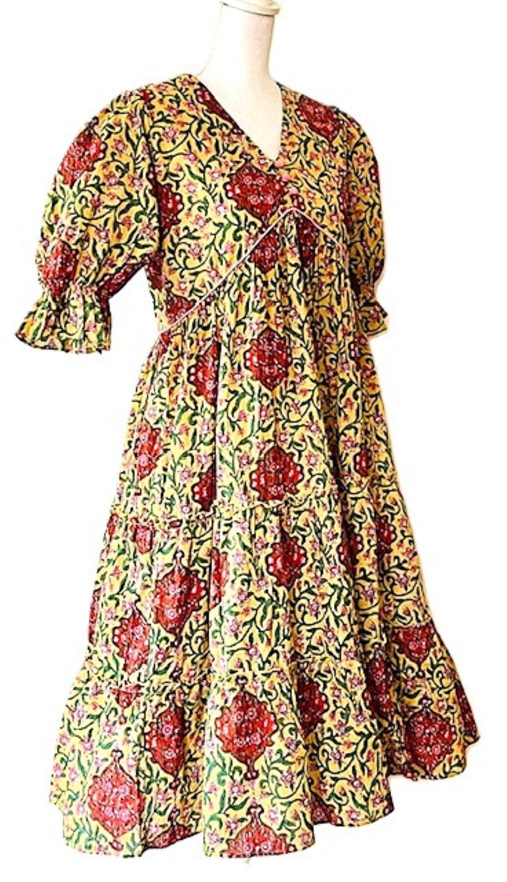 Elegant Block Print Knee Length Dress In A Complex Print.
