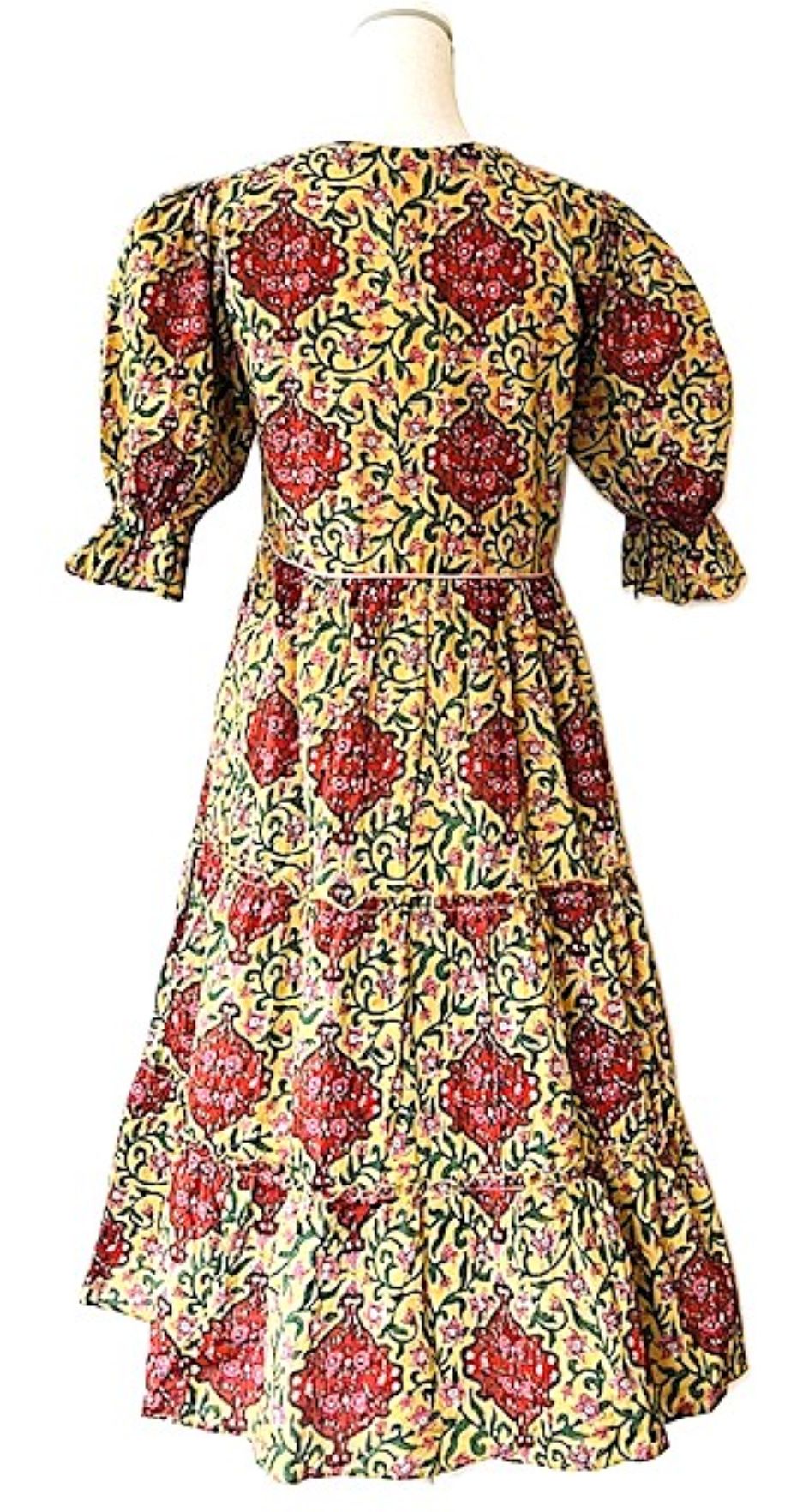 Elegant Block Print Knee Length Dress In A Complex Print.