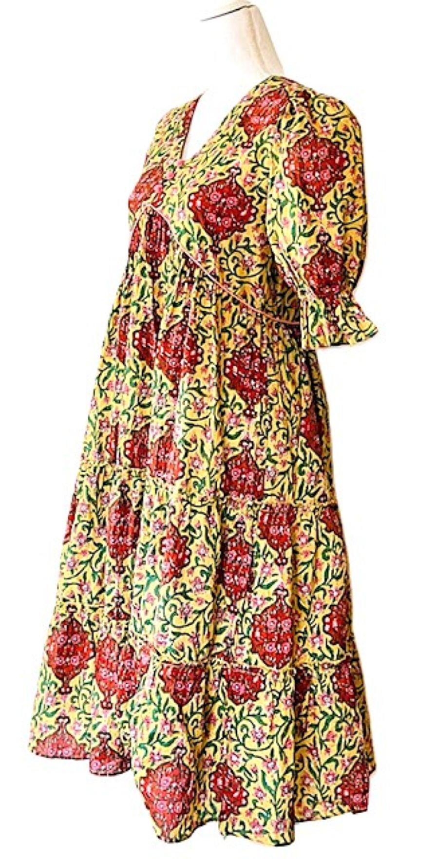 Elegant Block Print Knee Length Dress In A Complex Print.