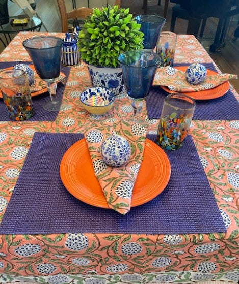 This Unusual Salmon and Navy Block Print Table Cloth (60x90) is exceptional.