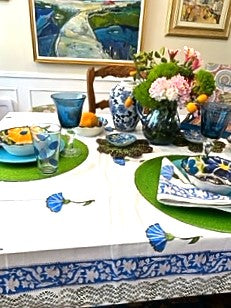 Set of White Linens With Bright Blue Petals Adorns The Table. (6 napkins/cloth)