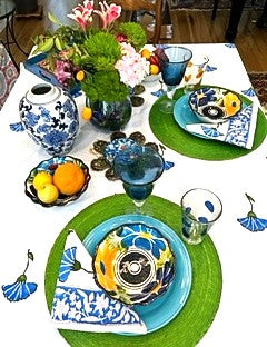 Set of White Linens With Bright Blue Petals Adorns The Table. (6 napkins/cloth)