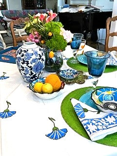 Set of White Linens With Bright Blue Petals Adorns The Table. (6 napkins/cloth)