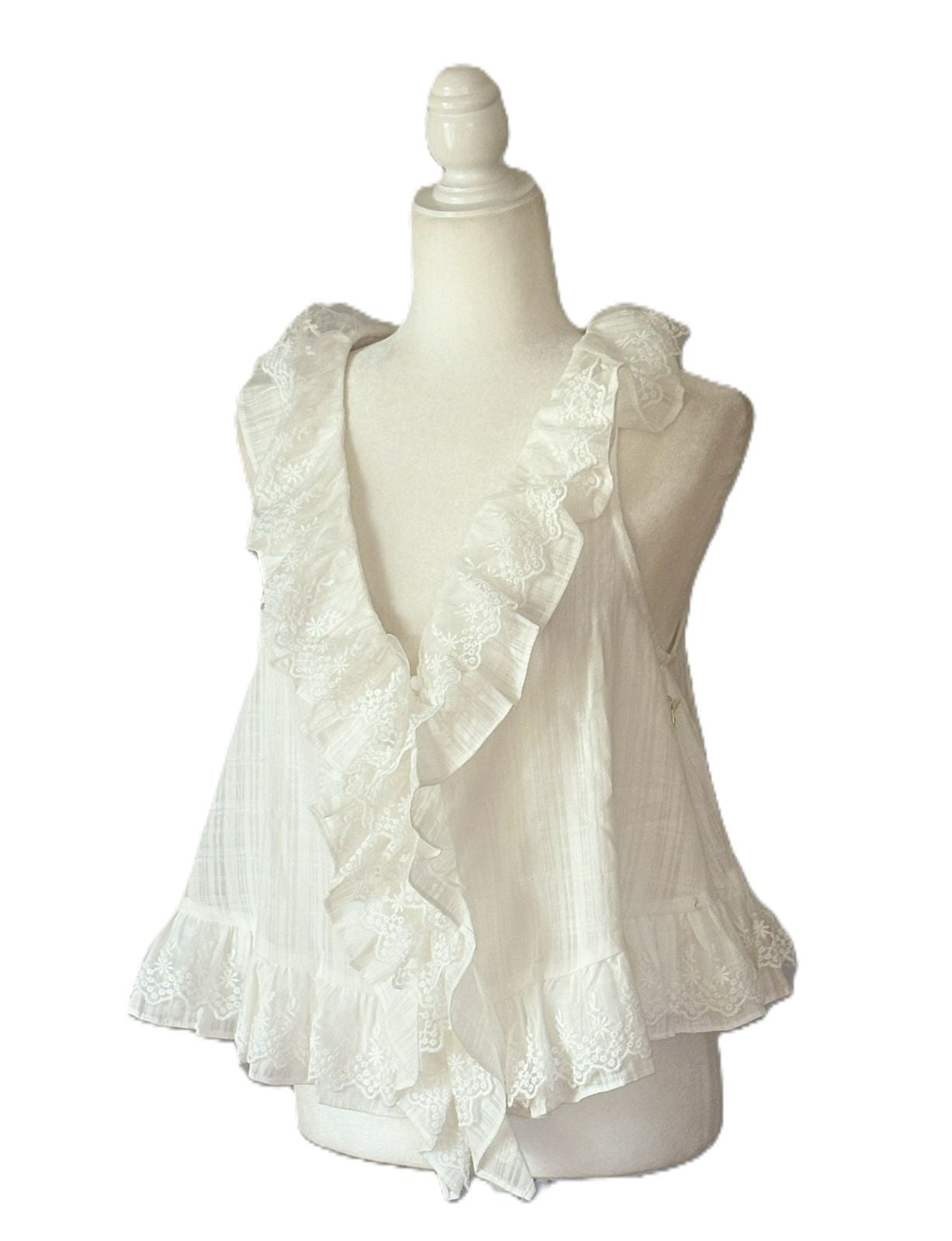 Sleeveless Blouse with Ruffled Embroidered Lace. Bestseller.