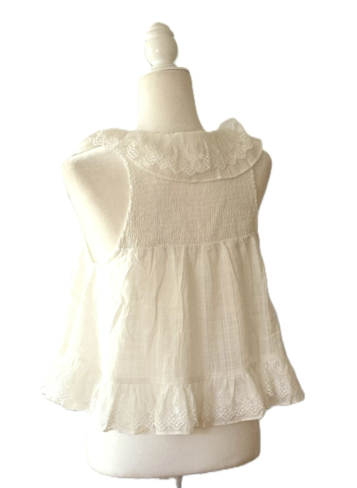 Sleeveless Blouse with Ruffled Embroidered Lace. Bestseller.
