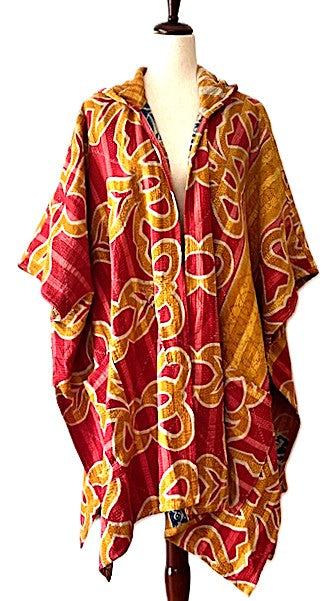Kantha Bae Peace and Love Poncho. (Red Abstract)