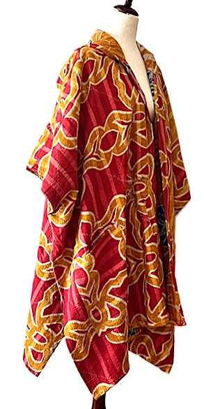 Kantha Bae Peace and Love Poncho. (Red Abstract)