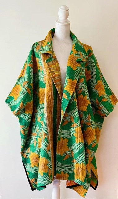 Fully Reversible Blanket Coat Is Bold In Green and Orange