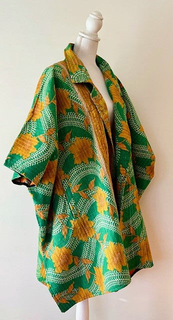 Fully Reversible Blanket Coat Is Bold In Green and Orange