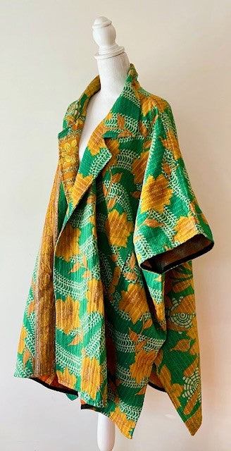 Fully Reversible Blanket Coat Is Bold In Green and Orange