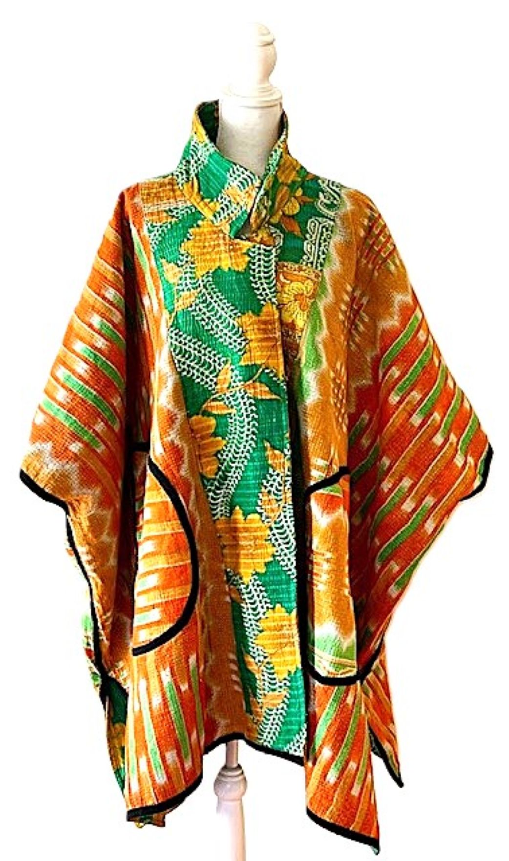 Fully Reversible Blanket Coat Is Bold In Green and Orange.