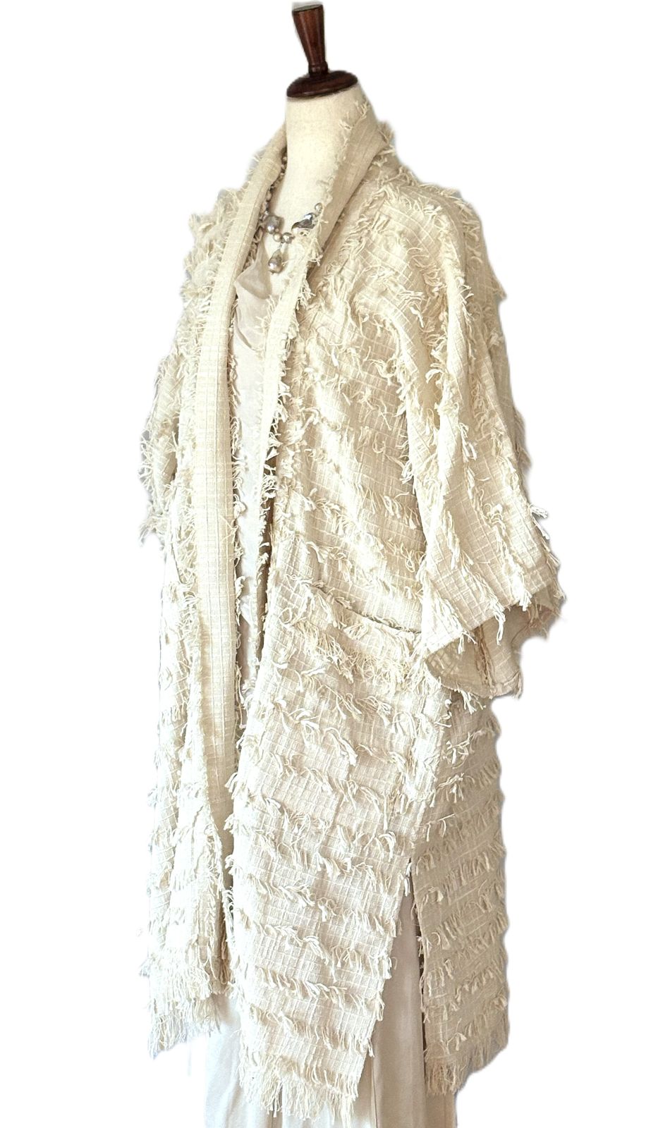 Jacket, Sophisticated Stroller Length Top Embellished With Fringe (Cream)