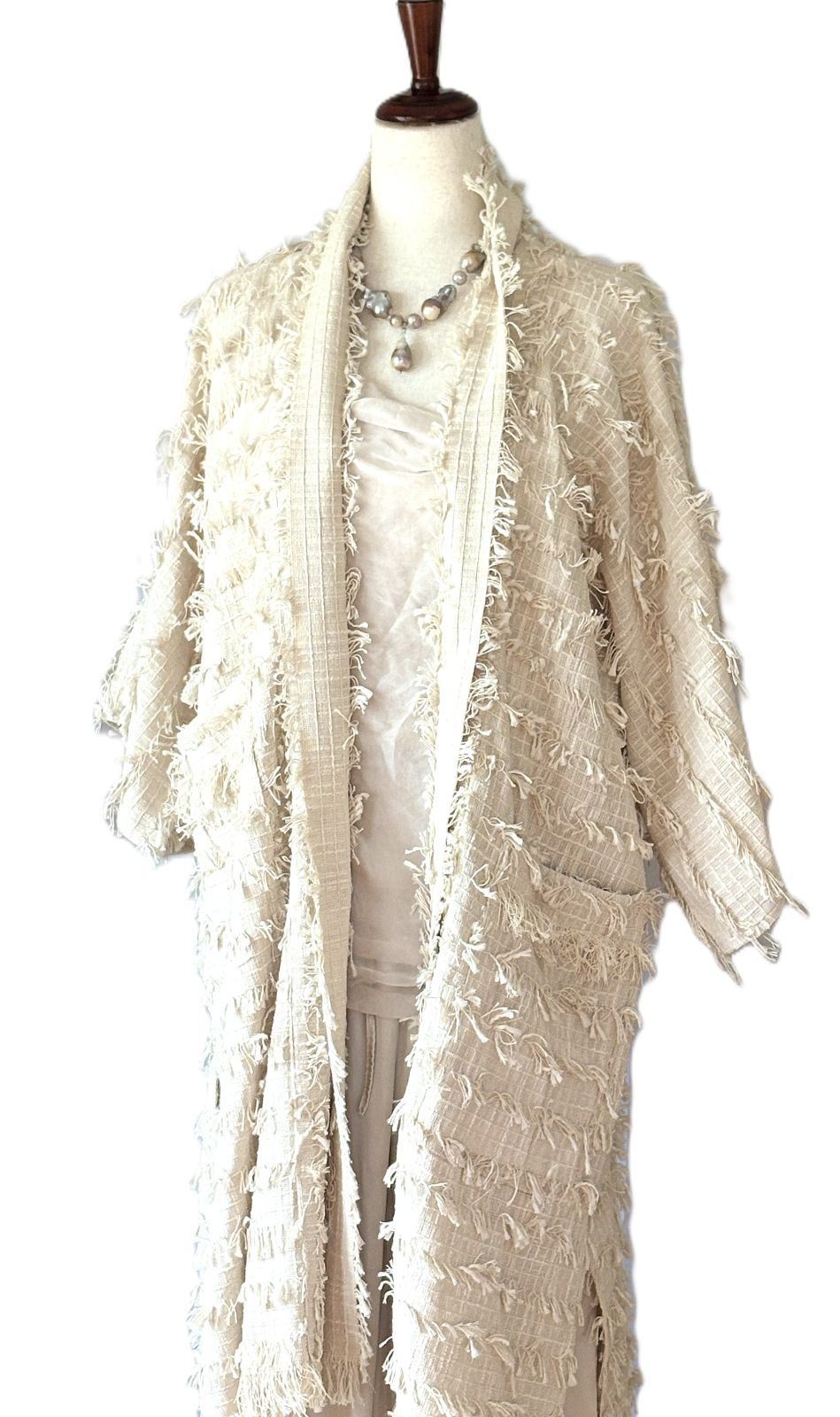Jacket, Sophisticated Stroller Length Top Embellished With Fringe (Cream)