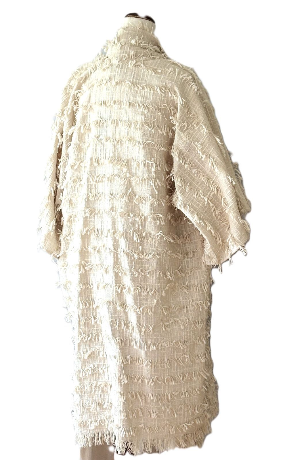 Jacket, Sophisticated Stroller Length Top Embellished With Fringe (Cream)