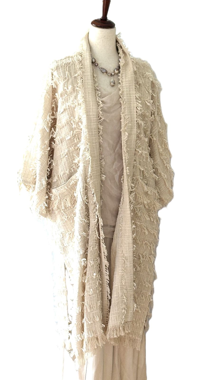 Jacket, Sophisticated Stroller Length Top Embellished With Fringe (Cream)
