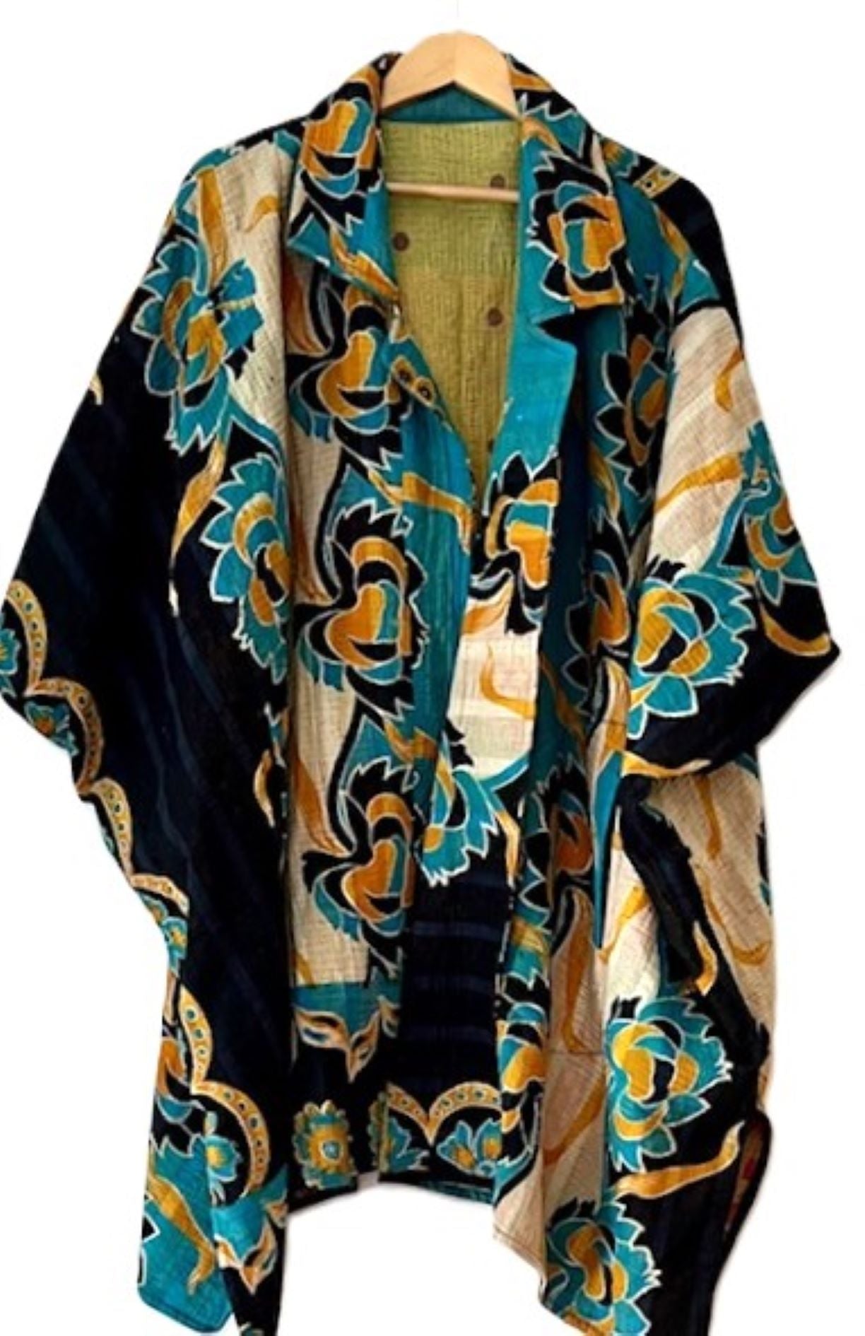 Fully Reversible Blanket Coat Is Beautiful In Turquoise Enhanced By A Border Floral Trim