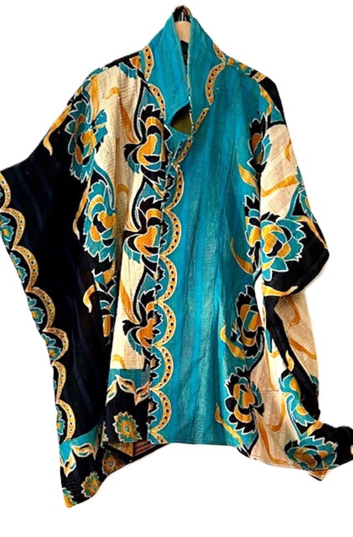 Fully Reversible Blanket Coat Is Beautiful In Turquoise Enhanced By A Border Floral Trim