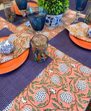 This Unusual Salmon and Navy Block Print Table Cloth (60x90) is exceptional.